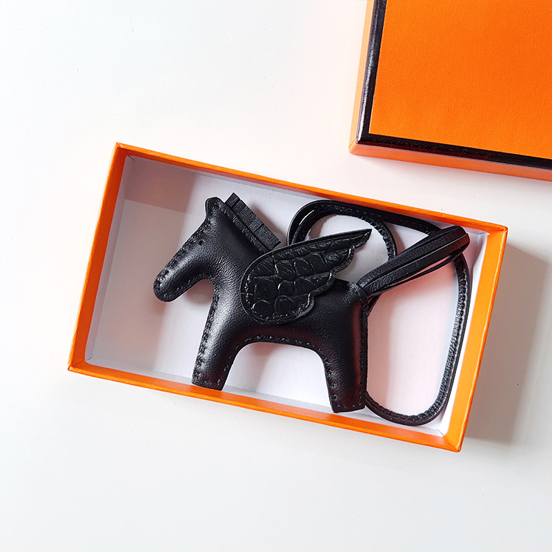 H Hand sewn pony pendant