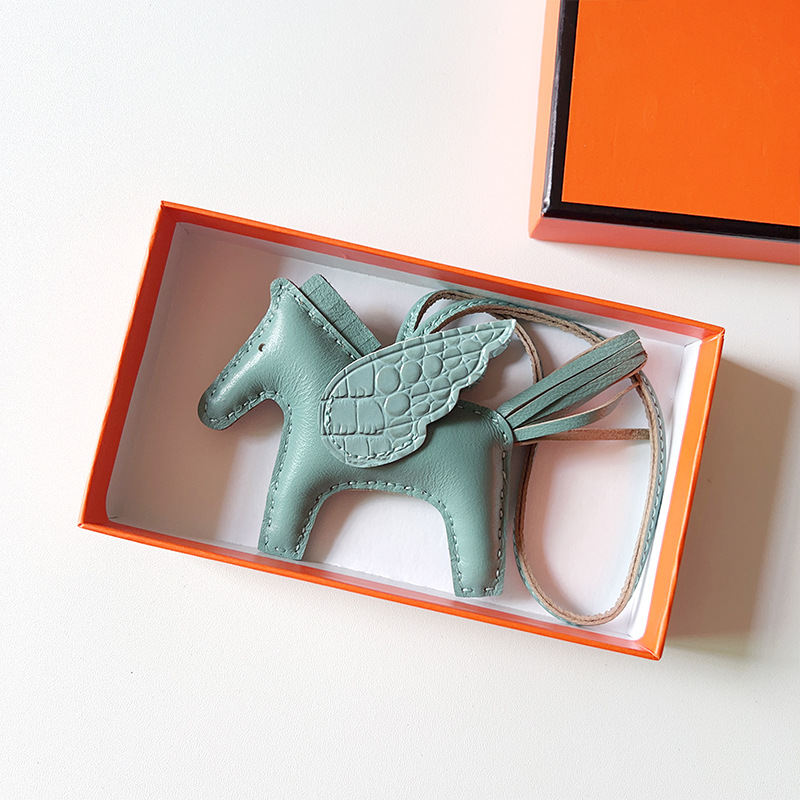 H Hand sewn pony pendant