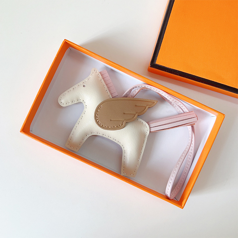 H Hand sewn pony pendant