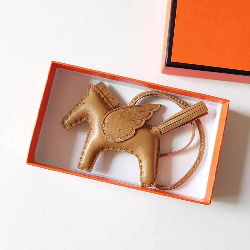 H Hand sewn pony pendant