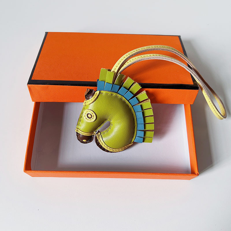 Handsewn unicorn pendant